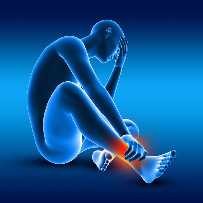 image of a male figure in pain holding his ankle, old pain 2 go